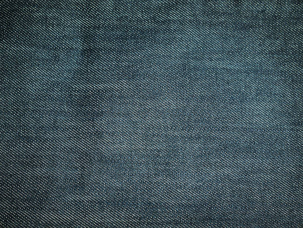 istock Texture of blue jeans background 532857952