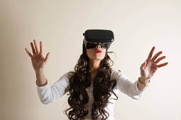 istock Woman in virtual reality helmet. VR glasses. 532858902