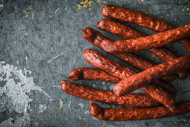 istock Chorizo Sausages on old metal background right 532861240