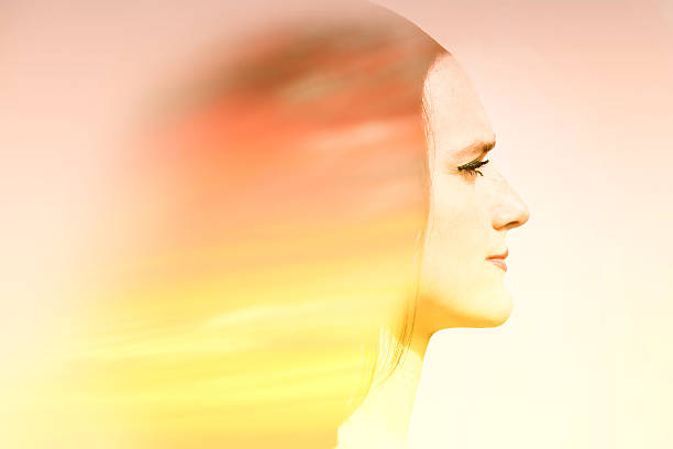 istock double exposure of beautiful woman with sky 532861564
