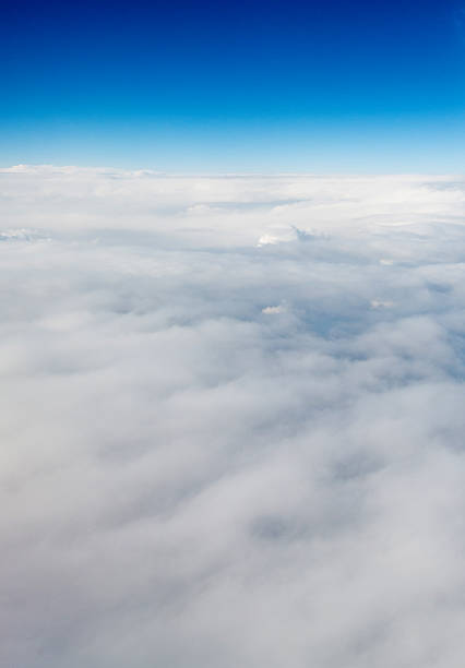 istock Aerial view of puffy clouds and blue sky 532861586