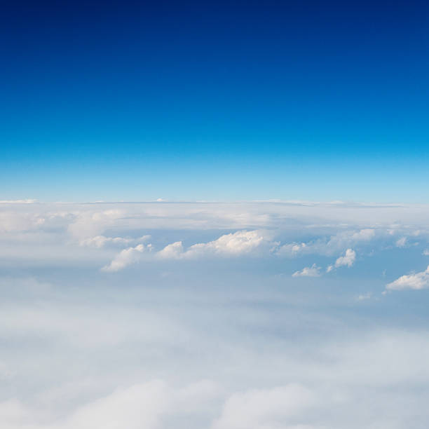 istock Aerial view of puffy clouds and blue sky 532861778