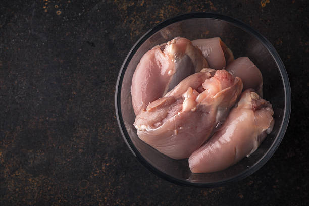 istock Chicken on a glass plate on a brown background 532862856