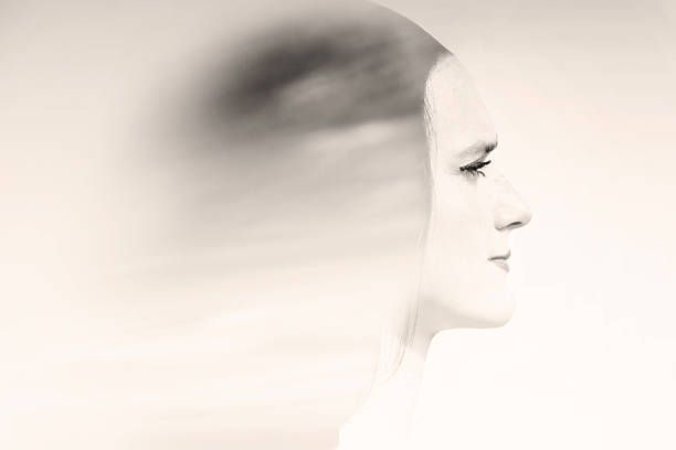 istock double exposure of beautiful woman with sky 532863216