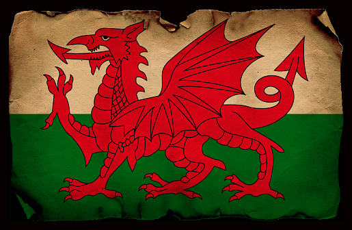 Welsh flag in grunge and vintage style.