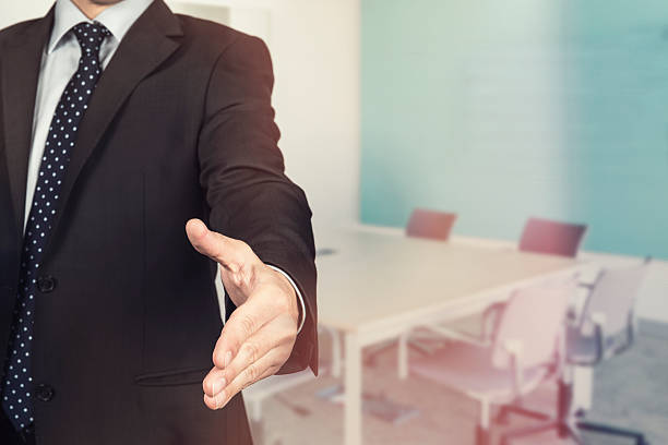 istock bussines man welcomes you 532866926