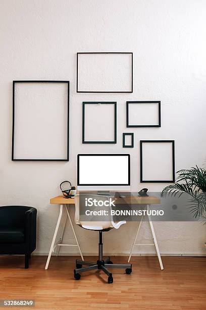 Modern Creative Workspace Stock Photo - Download Image Now - Picture Frame, Table, Wall - Building Feature