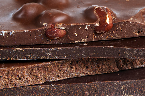 A closeup of chocolates (dark, milk).