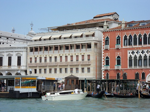 Venice, Veneto, Italy - June 2, 2014: the Hotel Danieli Excelsior is a modern building built in 1948 as a dependency of the historic Hotel Danieli, on the right. The palace, built in the fourteenth century to the Dandolo family, was bought in 1822 by Giuseppe Dal Niel who turned it into hotel.