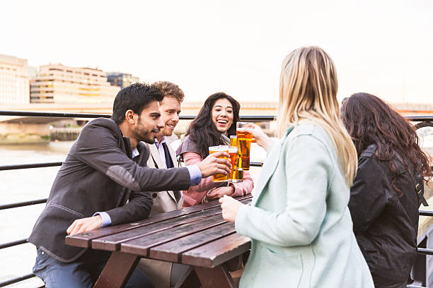 istock Business group drinking beer after work in London 532873570
