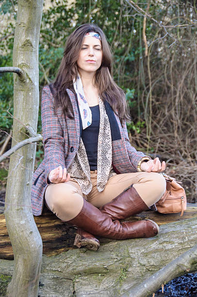 istock Girl meditating in the woods 532873717