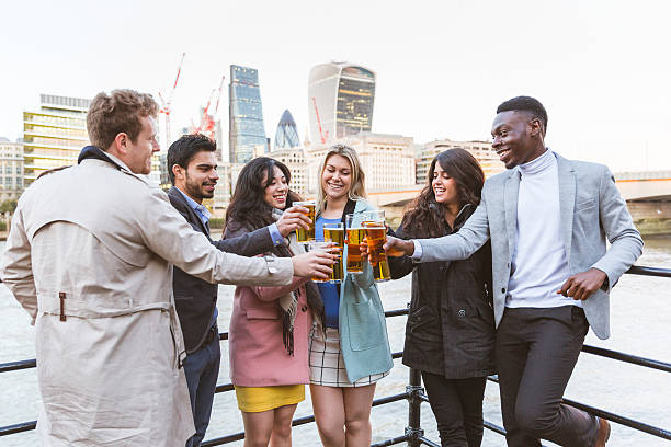 istock Business group drinking beer after work in London 532873868