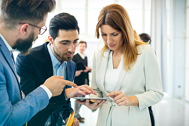 istock Businessman  discussing project with colleagues in office 532875564