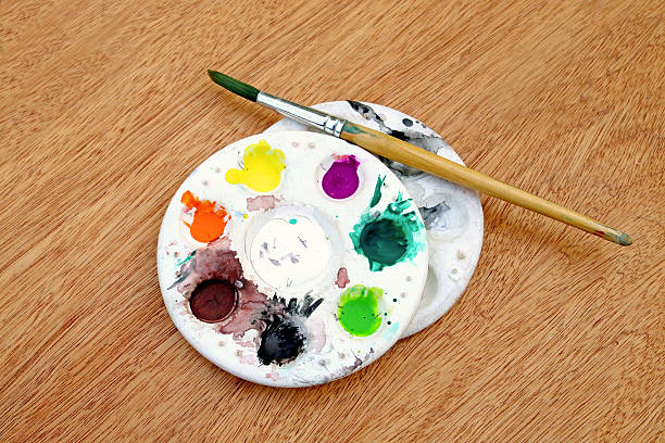 istock watercolor palette and brush 532876158