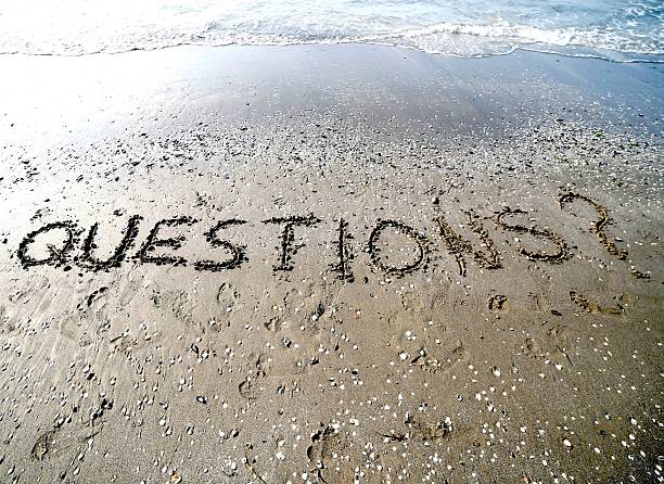 istock QUESTIONS written in the wet sand 532879284