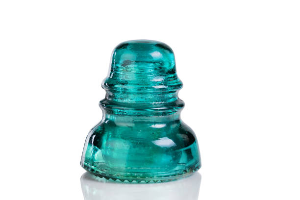 istock Antique glass insulator isolated on white background 532879450