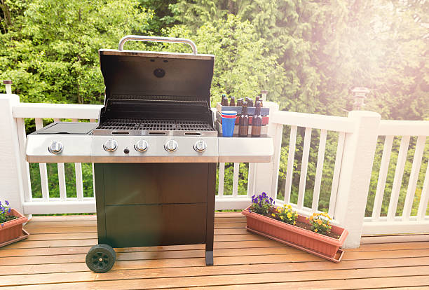 istock Bright daylight on deck wiht open barbecue cooker and beer 532879558