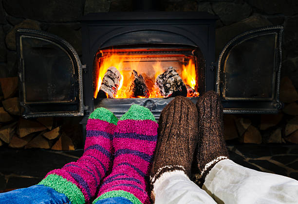 istock Warming feet on wood stove 532914449