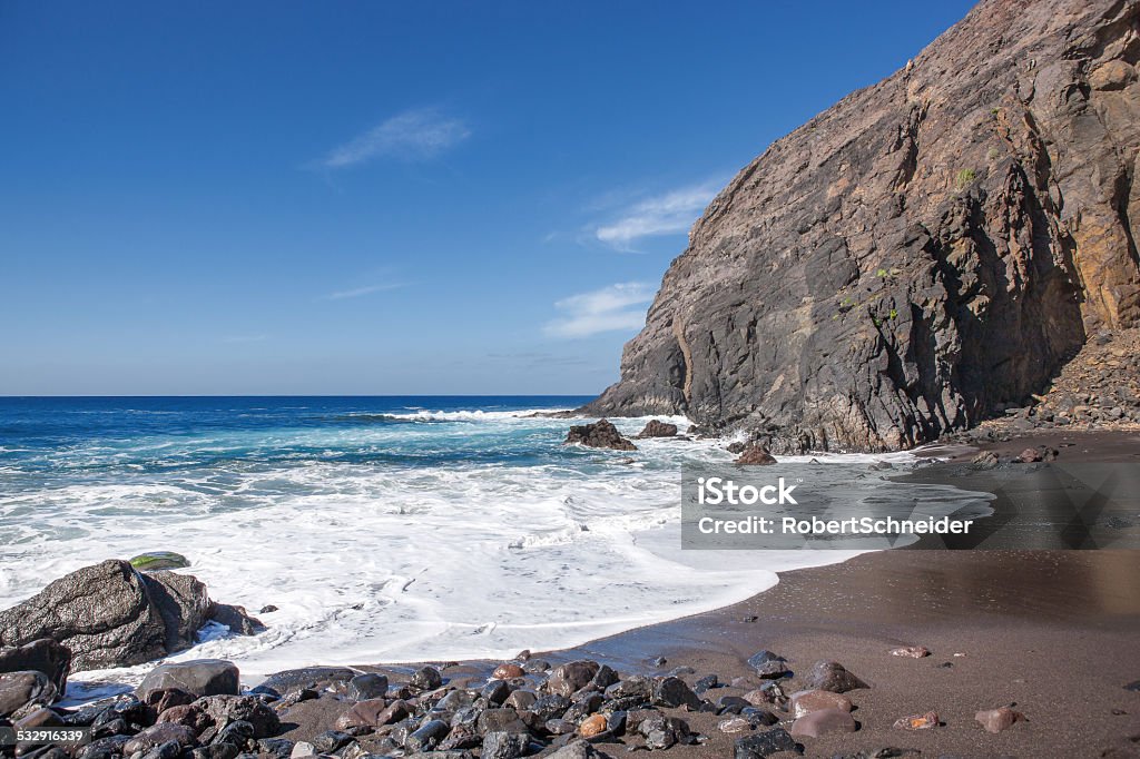 La Gomera - Playa del Trigo Lonely beach with black sand and impressive rock backdrop at the Playa del Trigo near Alojera in the west of La Gomera, Canary Island, Spain.  Gomera - Canary Islands Stock Photo