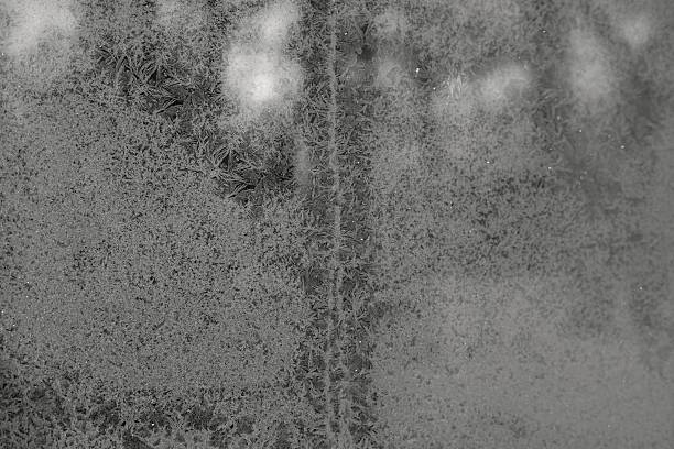 istock silvery ice hoarfrost on glass 532933743