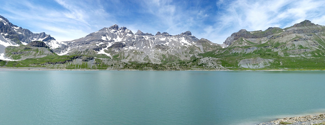 Stitched panorama composed of 5 pictures. The artificial lake of Salanfe and the famous Dents du Midi in the canton of Valais - Switzerland. Valley of \