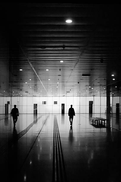 istock Person silhouetted in a corridor. 532936131