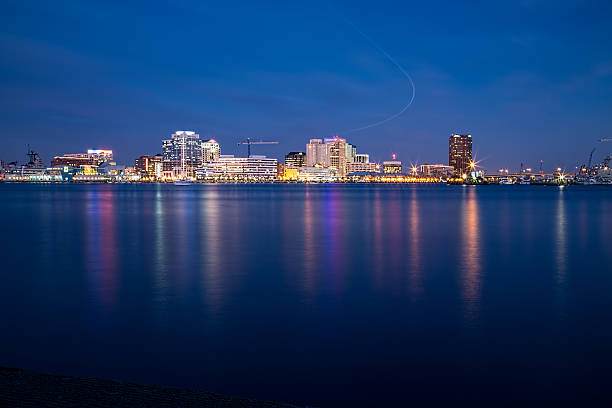 istock Norfolk, Virginia skyline and airline light trail at dusk. 532937039
