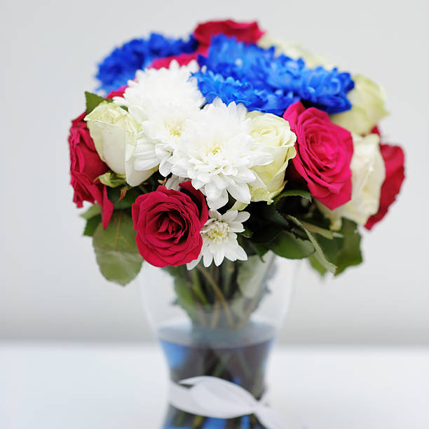 Free Stock Photo of White Vase Filled With Red and Blue Flowers ...