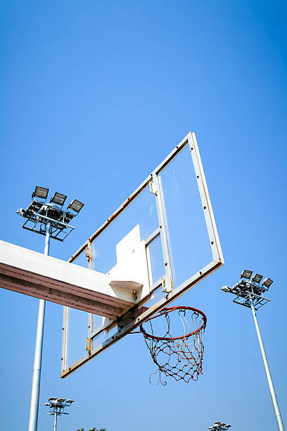 istock Basketball hoop in the blue sky 532938371