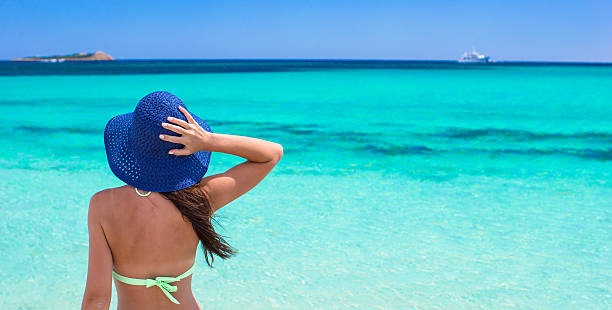 istock Young woman enjoy tropical beach vacation 532938935