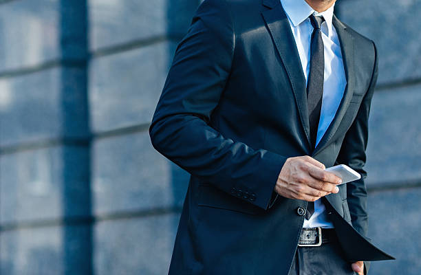 istock businessman holding a smartphone 532940209