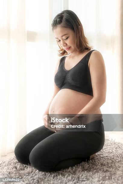 Asian Girl Is Going To Be A Mom Stock Photo - Download Image Now - Adult, Adults Only, Anticipation