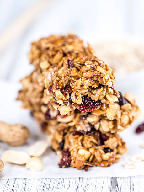 istock Homemade Granola Bars with Peanuts and Cranberries (selective fo 532949814
