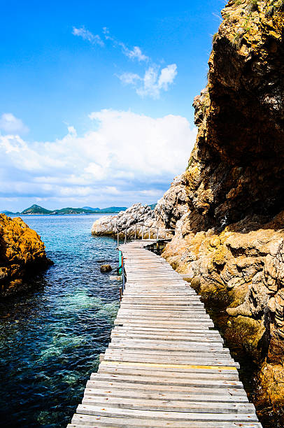 istock Wood bridge on sea 532949998