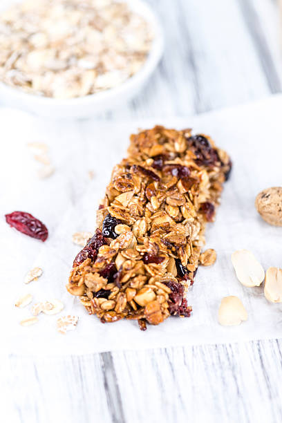 istock Homemade Granola Bars with Peanuts and Cranberries (selective fo 532950026
