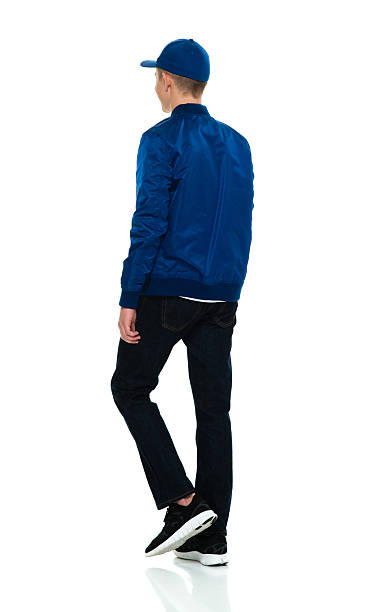 istock Rear view of male walking 532950184