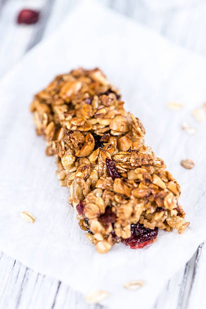 istock Homemade Granola Bars with Peanuts and Cranberries (selective fo 532950370