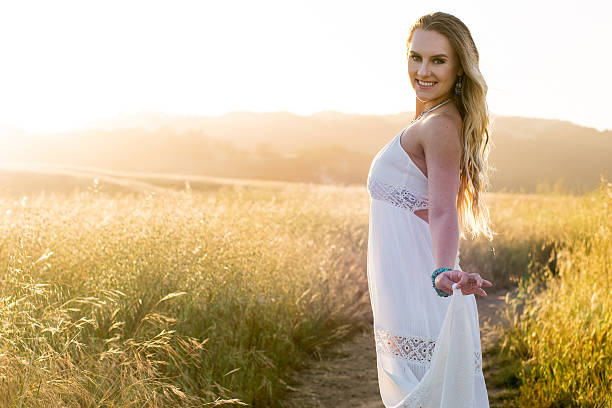 istock Boho beauty in a field of golden grass 532951084
