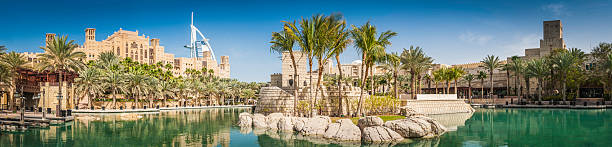 Dubai palm trees lagoon hotels and restaurants Burj panorama UAE