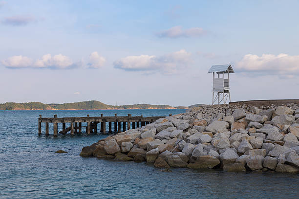istock White small lifeguard tower, seacoast skyline 532955242