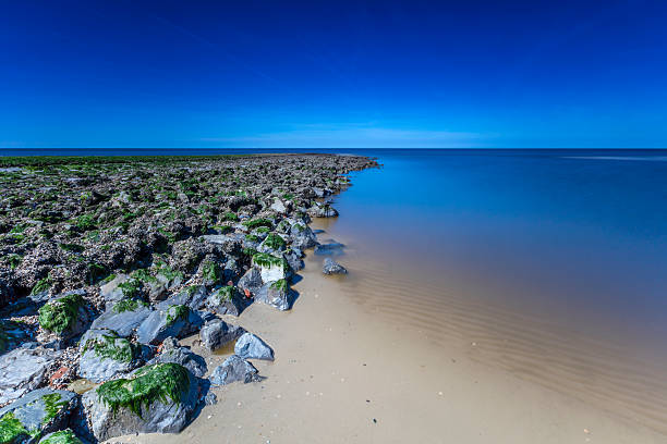 North Sea Breakwater In Long Exposure.