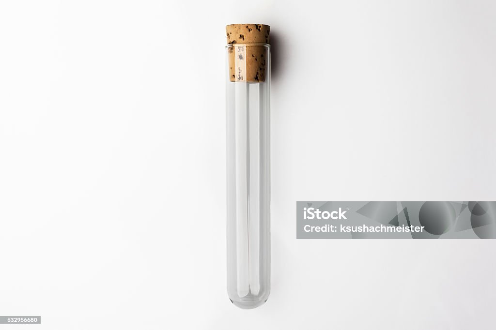 Test tube closed with cork on white background Empty glass transparent test tube closed with cork on white background Test Tube Stock Photo