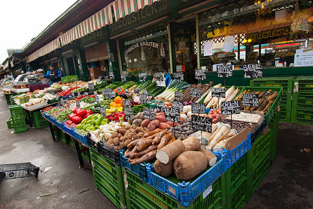 Vienna, Austria - September 20, 2014: Vendor's stall selling fruit and vegetables at the Naschmarkt in Vienna, Austria