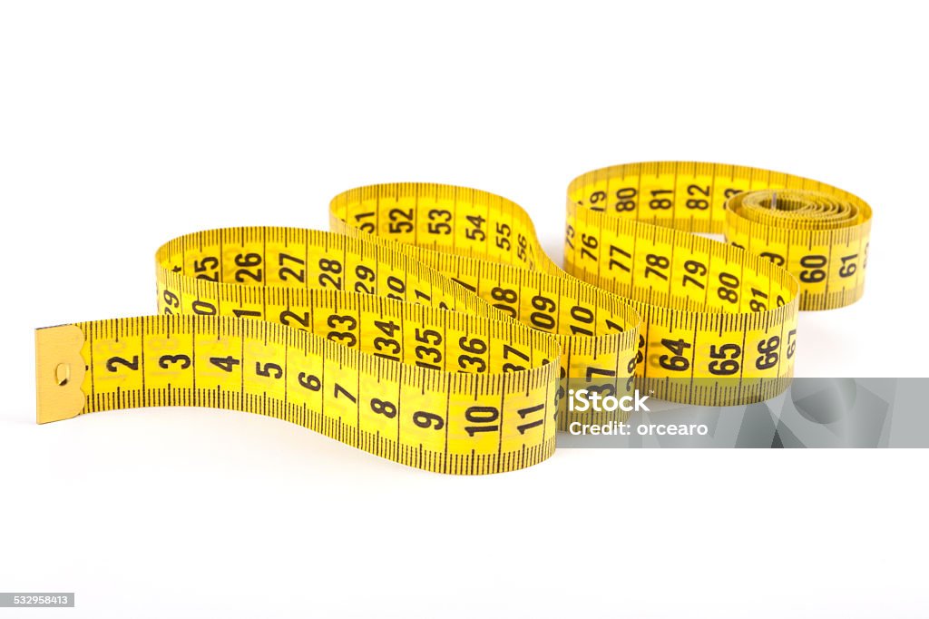 Yellow Tape Yellow measuring tape isolated on white background 2015 Stock Photo