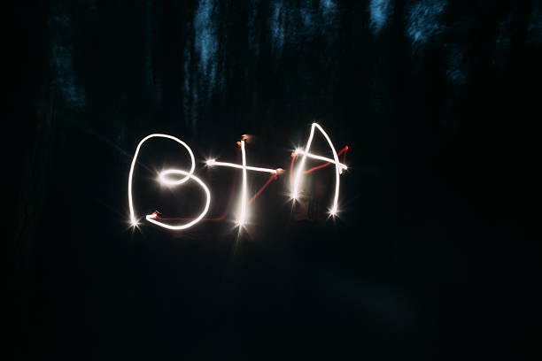 istock Light painting of initials on night background 532959260