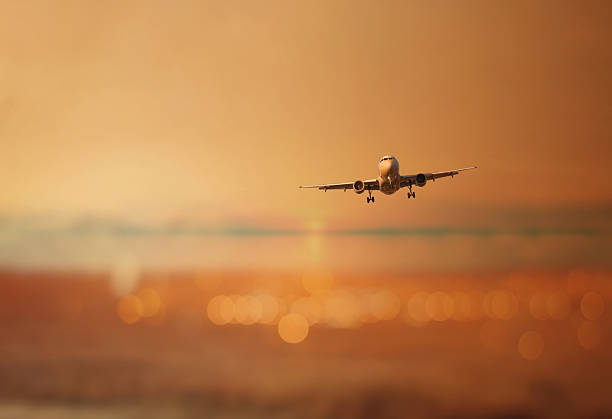 istock Silhouette of an airplane in flight 532959316