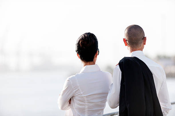 istock Two business colleague looking outside 532960921