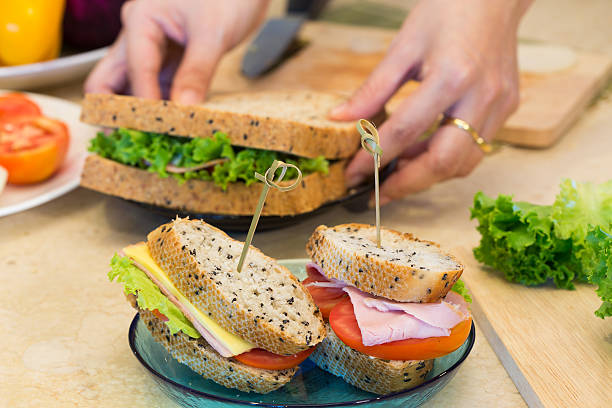 istock healthy sandwich  ham cheese lettuce tomato and onion. 532961054