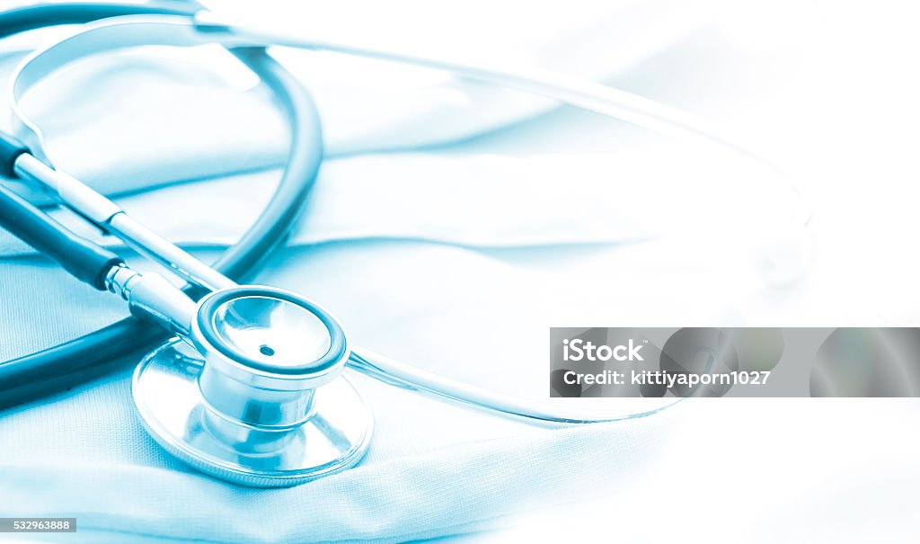 Medical or science with soft light background Blue stethoscope isolate on white background Healthcare And Medicine Stock Photo