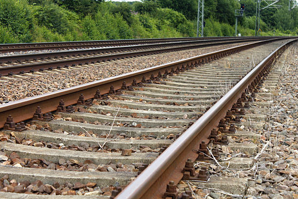 istock iron rusty train railway detail dark stones 532965336